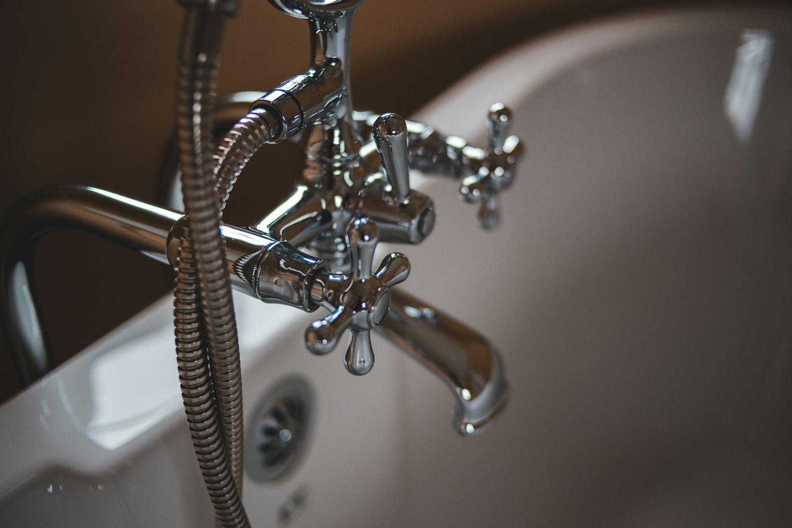 Copper plumbing pipes under a sink
